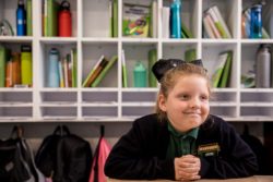 Girl smiling in classroom