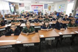 students sitting at desks