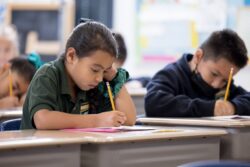 student sitting at desk