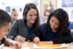 teacher and student in classroom